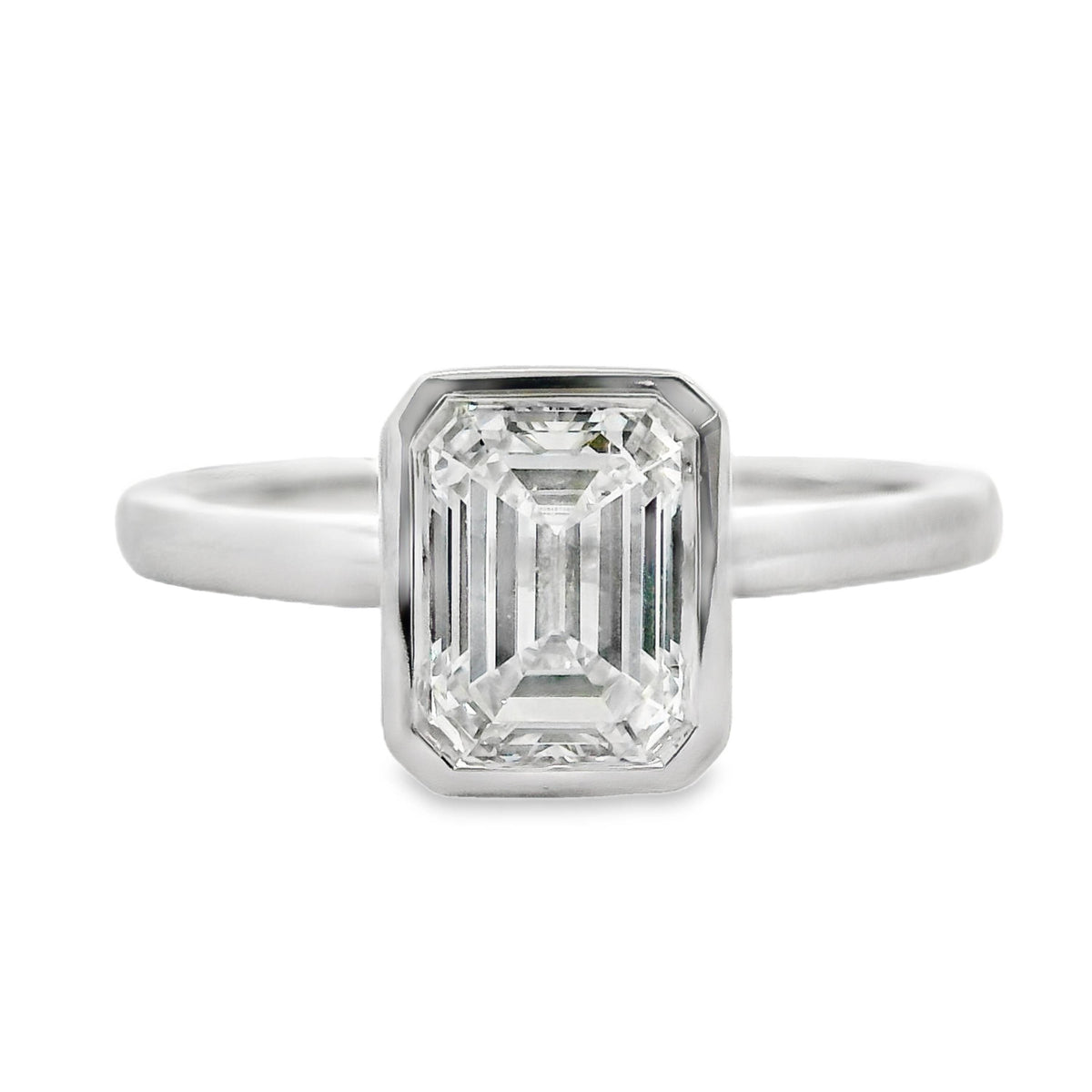 Norah 18ct White Gold Emerald Cut Bezel Set Solitaire Ring