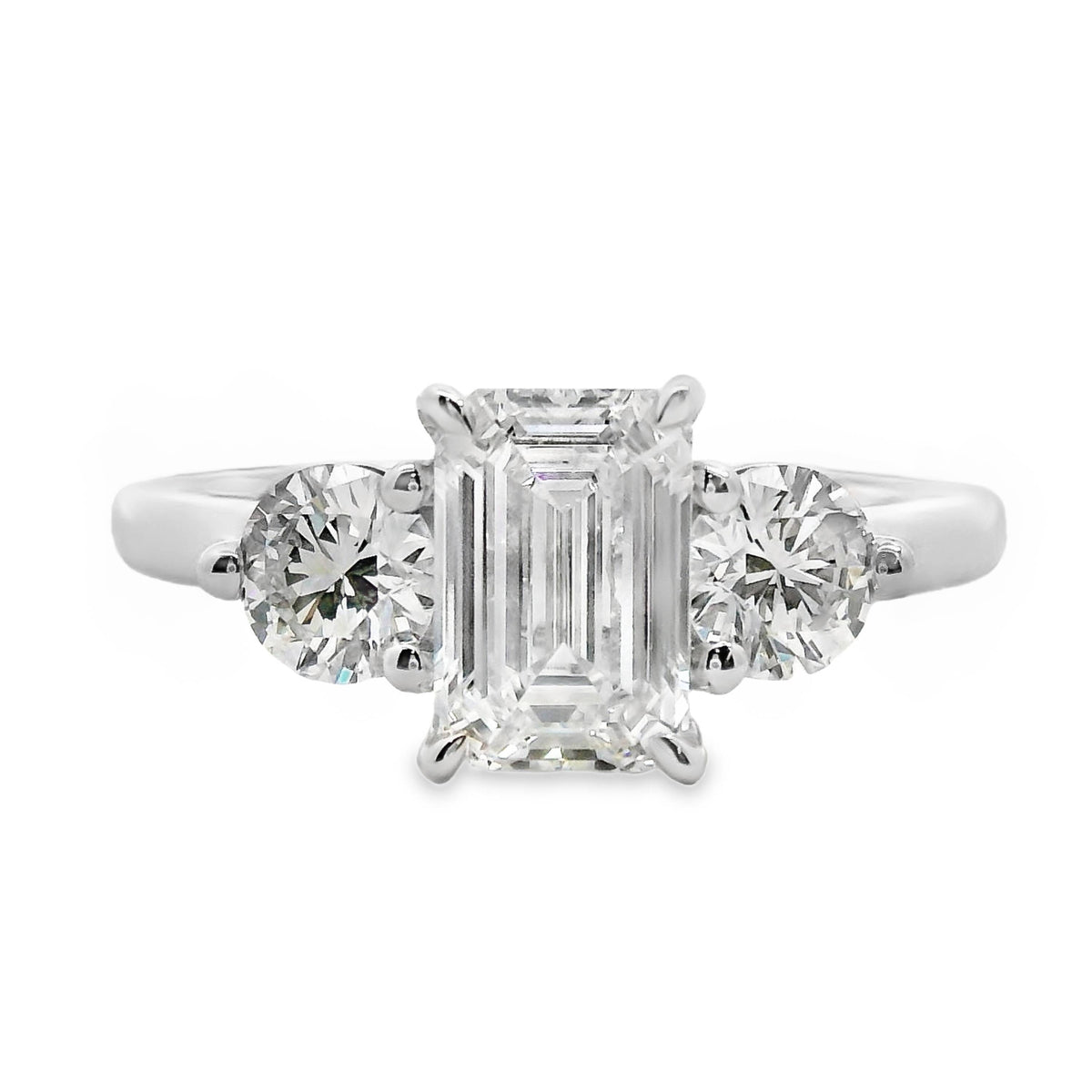 Lottie 18ct White Gold Emerald Cut And Round Brilliant Cut Trilogy Ring