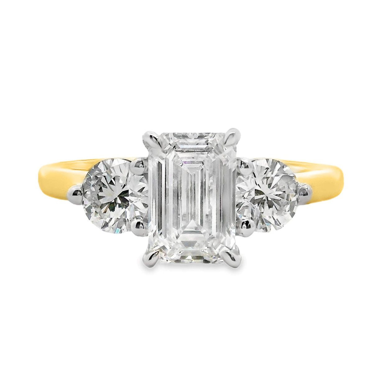 Lottie 18ct Yellow And White Gold Emerald Cut And Round Brilliant Cut Trilogy Ring