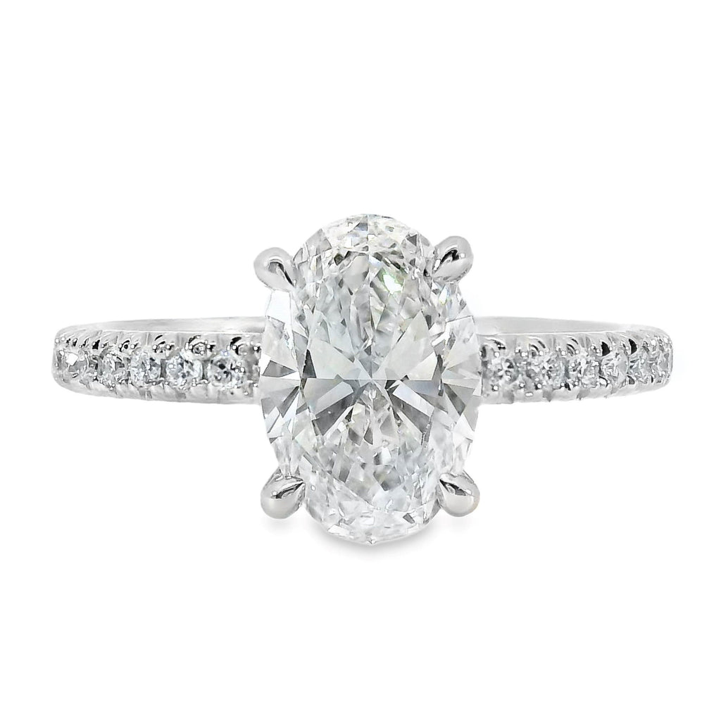 Elsie 18ct White Gold Oval Cut Solitaire Hidden Halo Ring