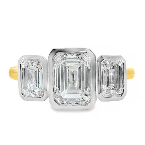 London 18ct Yellow And White Gold Emerald Cut Bezel Set Trilogy Ring