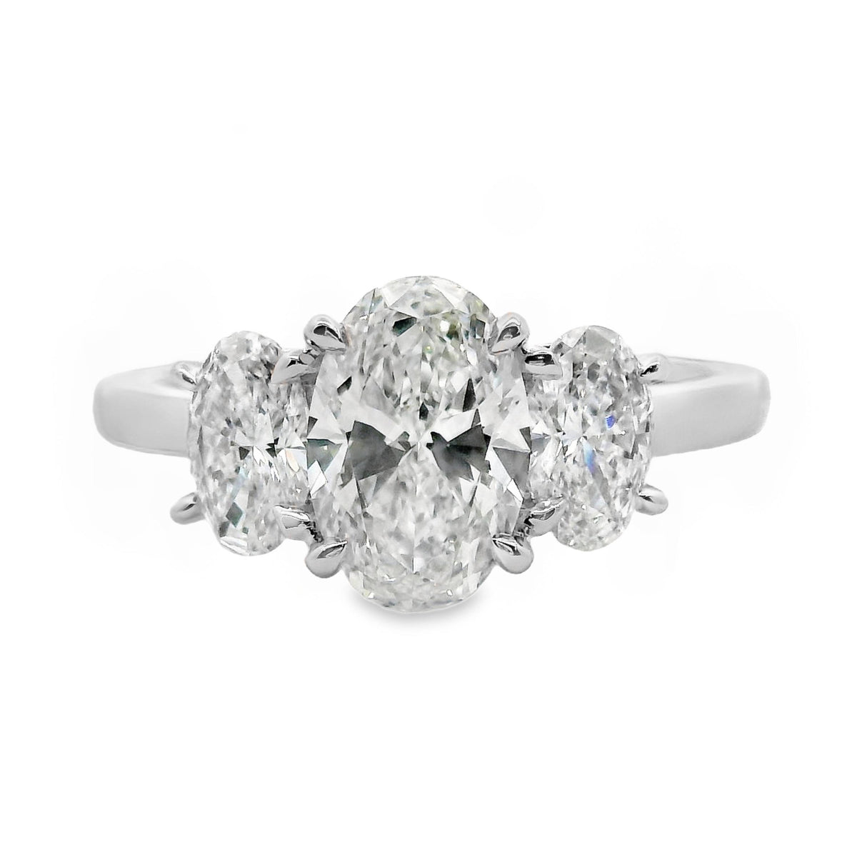 Mabel 18ct White Gold Oval Cut Trilogy Ring