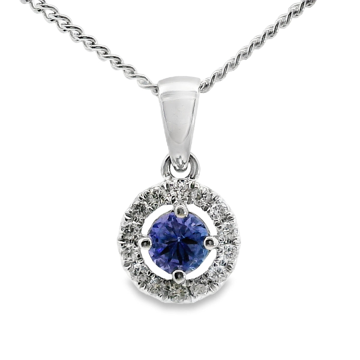 18ct White Gold Tanzanite And Diamond Halo Set Pendant
