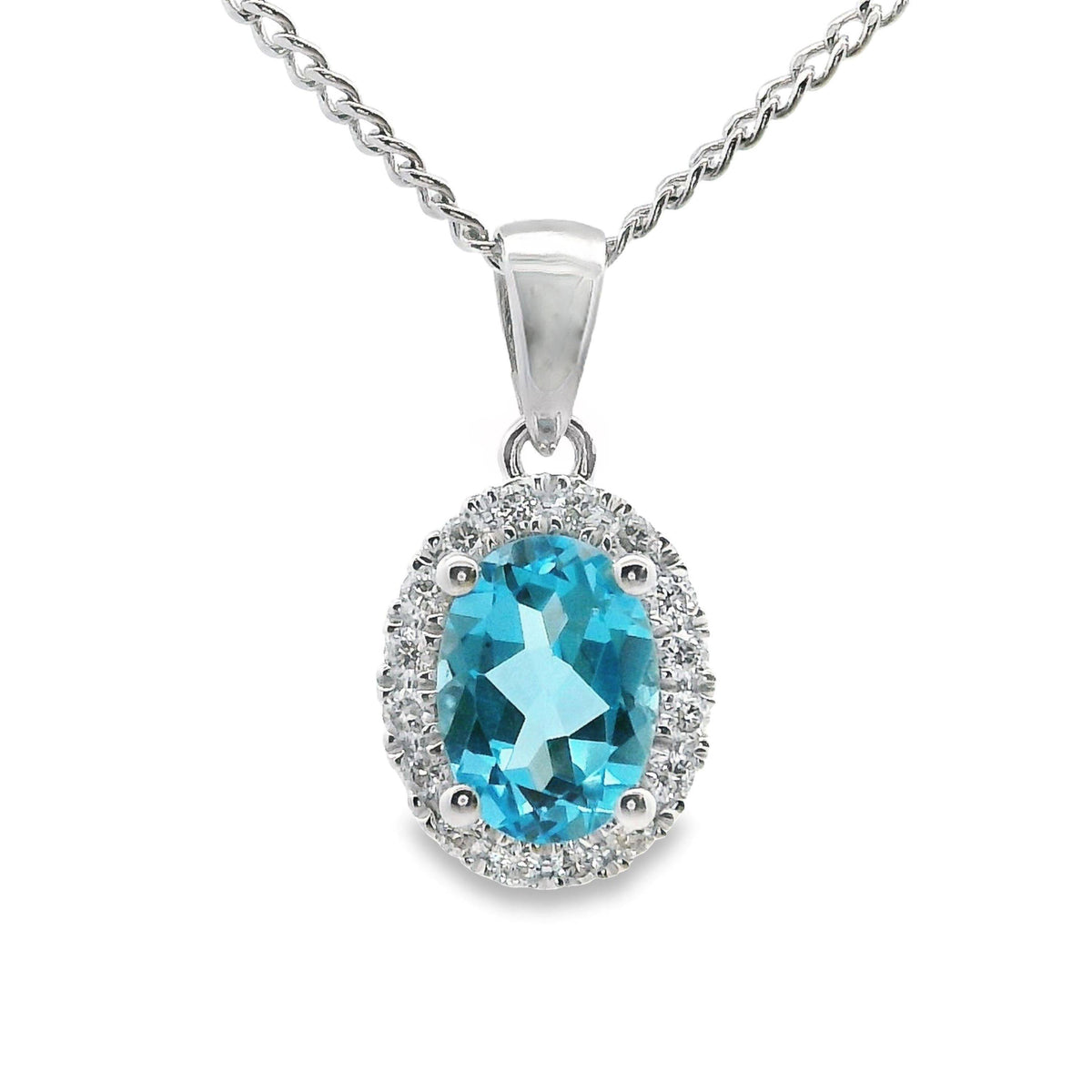 9ct White Gold Blue Topaz And Diamond Halo Pendant