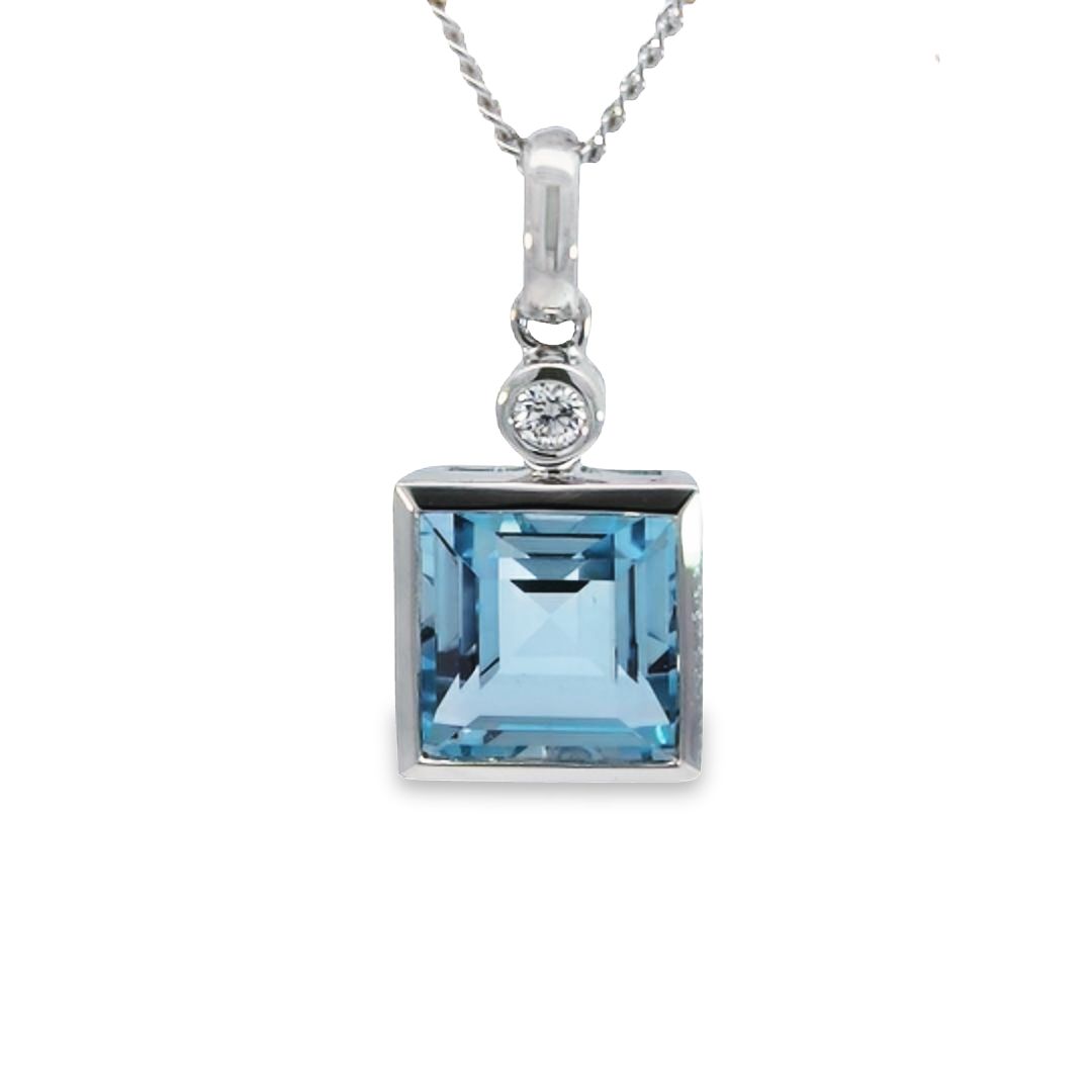 9ct White Gold Blue Topaz And Diamond Pendant