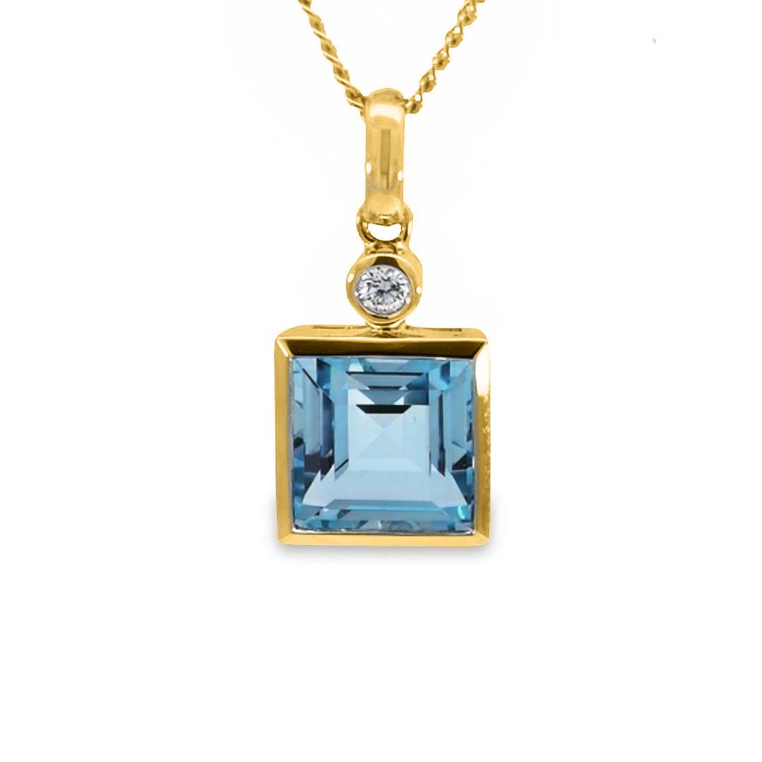 Blue Topaz And Diamond Pendant
