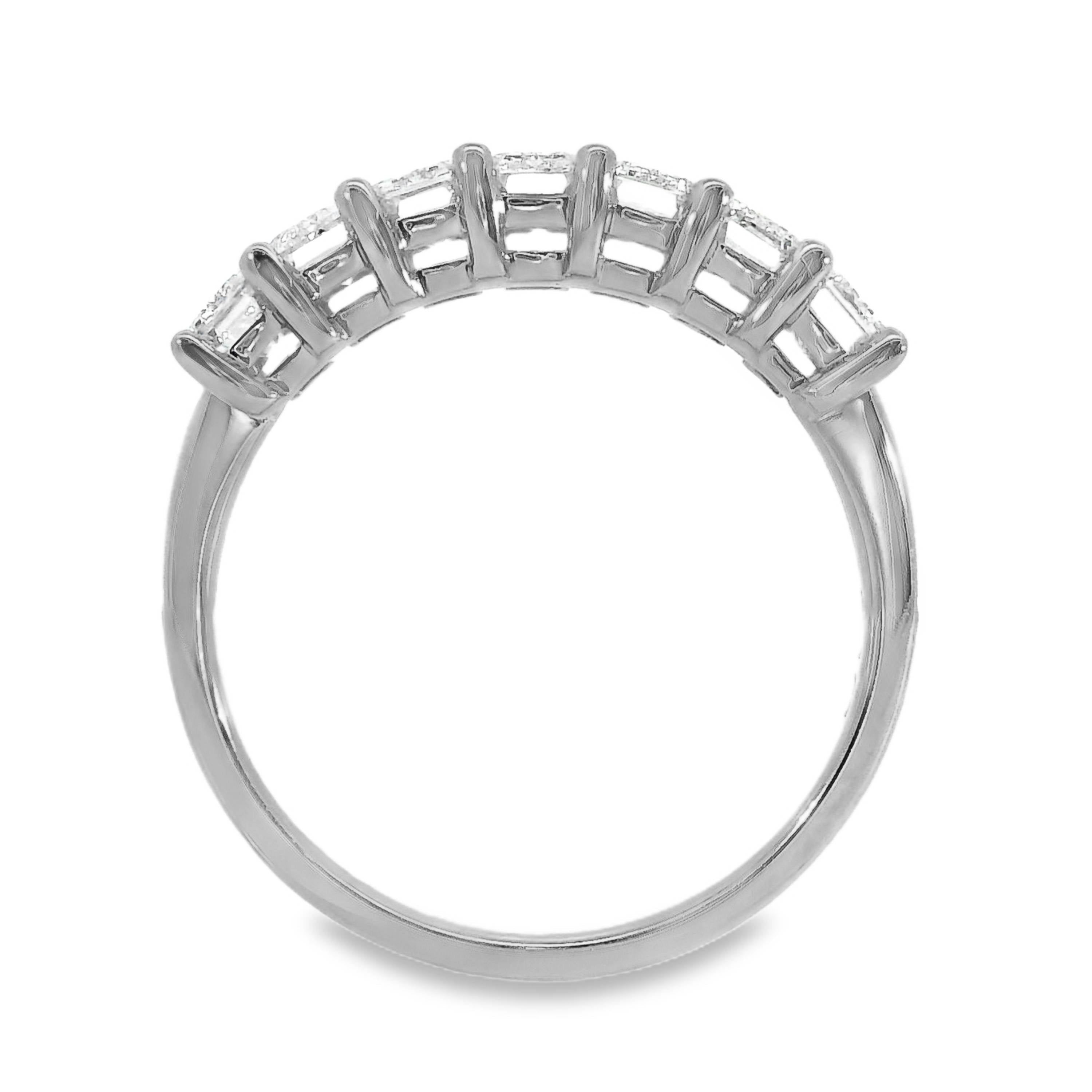 Iris Emerald Cut 7 Diamond Ring