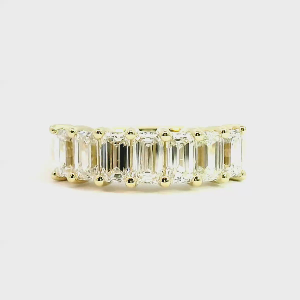 Iris Emerald Cut 7 Diamond Ring